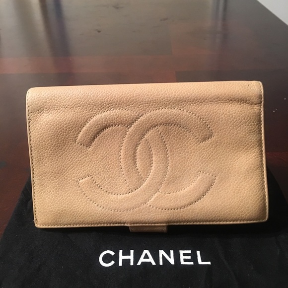 CHANEL Handbags - Authentic Chanel CC logo Tan canvia Leather wallet